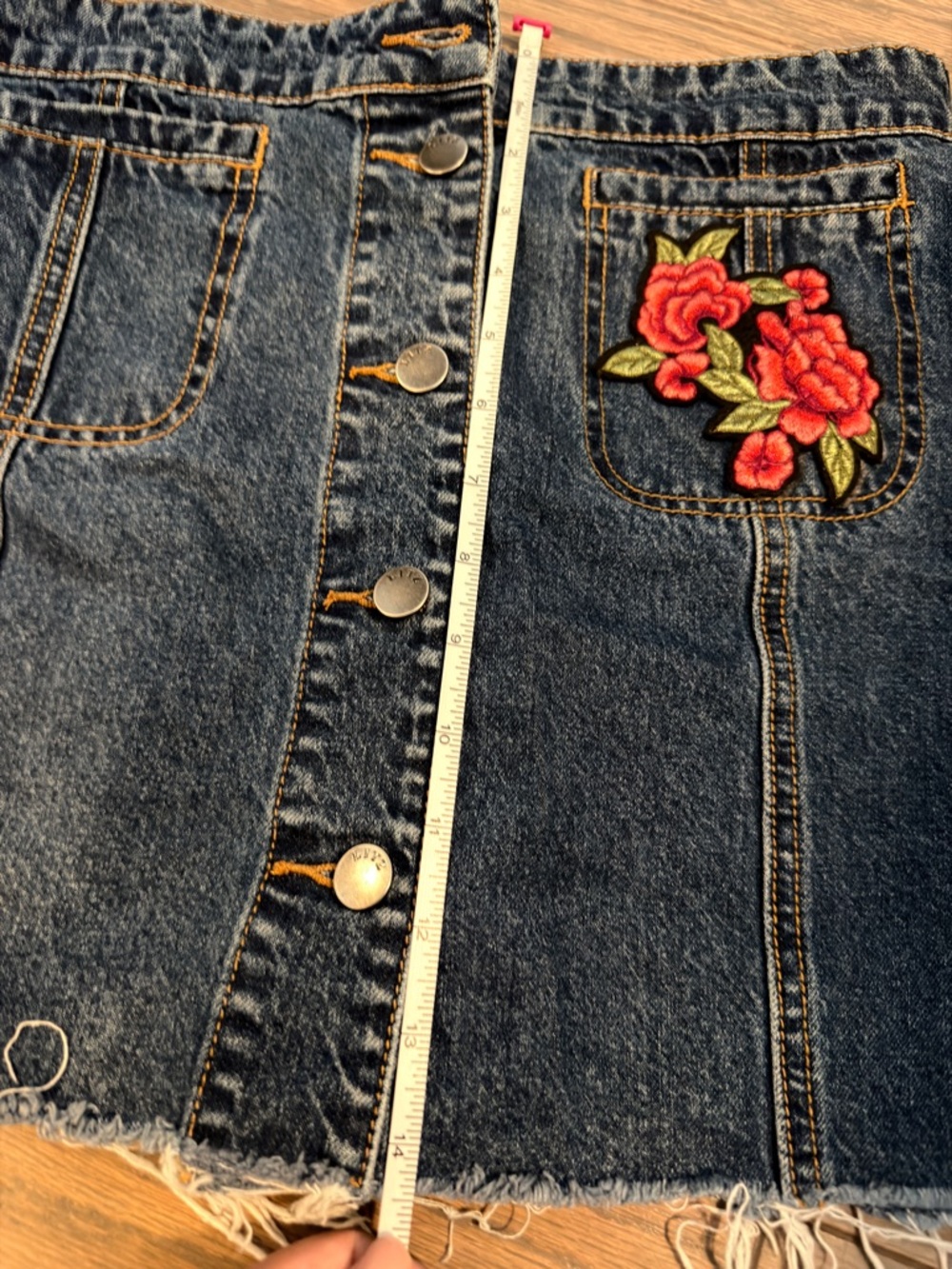 Dark Blue Denim Button-Front Mini Skirt with Embroidered Floral Pocket - Picture 2 of 8